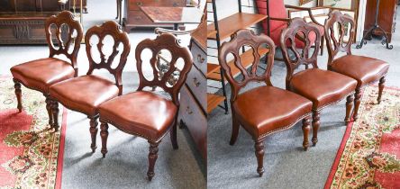 A Set of Six Victorian Mahogany Dining Chairs, with carved scrollwork top-rails, shaped & triple