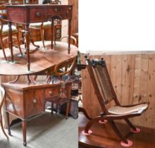 A Victorian Crossbanded Mahogany Bow Fronted Writing Table, with three drawers and on tapering