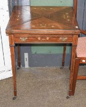 A Late Victorian Rosewood Envelope Folding Card Table, with boxwood and ivorine marquetry inlay,