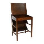 A Small Oak Clerks Desk, with two undershelves and on square supports, 64cm by 54cm by 83cm