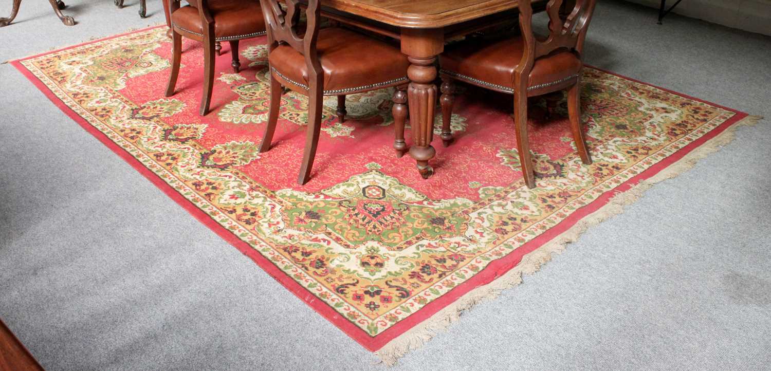 Machine Made Carpet of Oriental Design, the raspberry field centred by ivory medallion enclosed by - Image 3 of 3