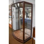 A Mahogany Bow Fronted Museum Display Cabinet, early 20th Century, makers Samuel Elliott & Sons,