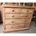 A Victorian Mahogany Four Height Chest of Drawers, two short over three long graduated drawers, on