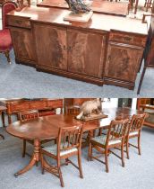 A 19th Century Mahogany Triple Pillar Dining Table, and six mahogany dining chairs, together with