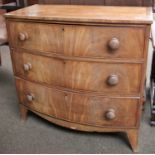 An Early 19th Century Mahogany and Crossbanded Bowfront Chest of Three Drawers, 90cm by 93cm by