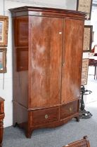 An Edwardian Inlaid Mahogany Bow Fronted Wardrobe, fitted with as base drawer, 130cm by 70cm by