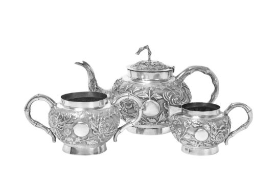 A Three-Piece Silver Tea-Service, Incuse Maker's Mark T?, Perhaps Indian, 20th Century - Image 1 of 8