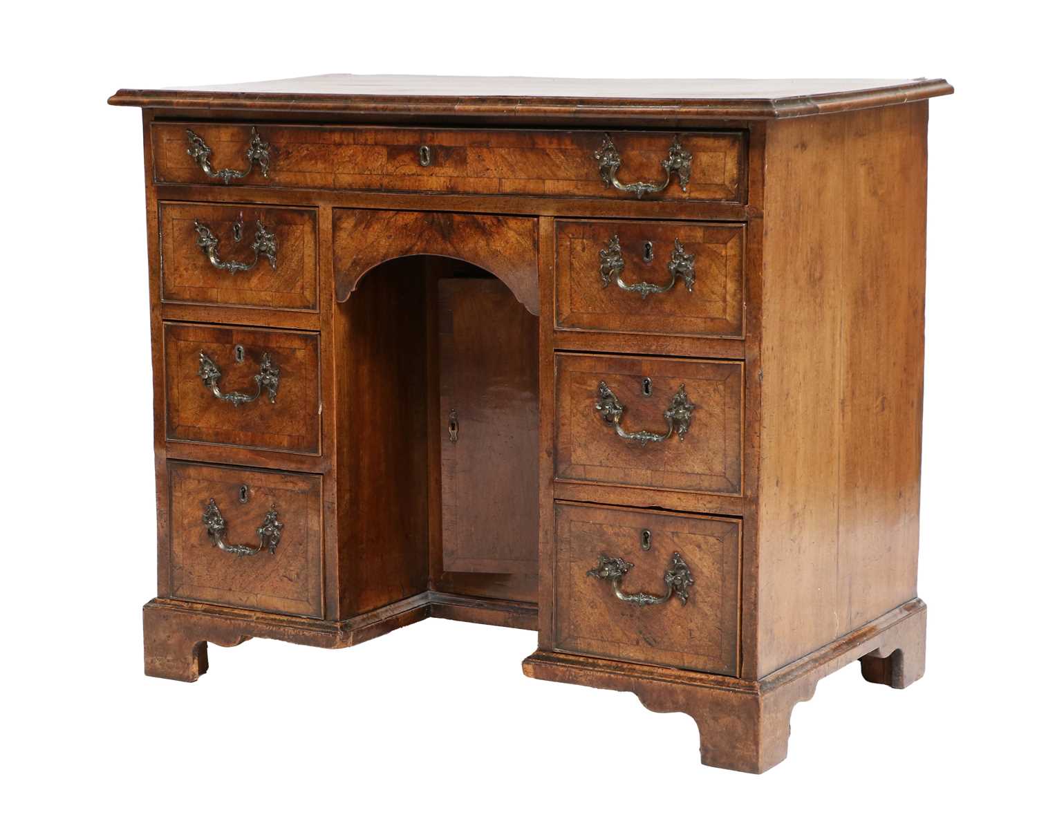 A George II Walnut and Crossbanded Bureau-Table, 2nd quarter 18th century, the moulded top above