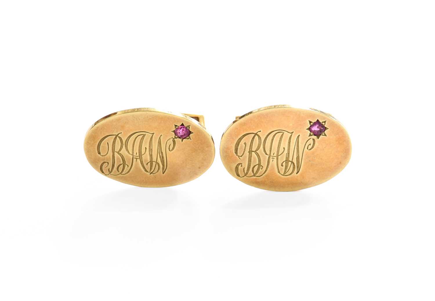 A Pair of 9 Carat Gold Ruby Cufflinks, the oval plaques engraved with initials BAW, with round cut