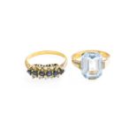 A 9 Carat Gold Sapphire and Diamond Ring, six round cut sapphires flanked by rows of round brilliant