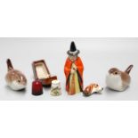 A Royal Worcester Witch Candle Snuffer, a Royal Worcester thimble in case, Royal Doulton fox hound