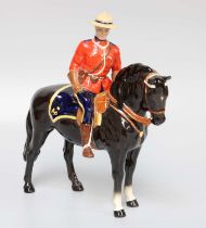 Beswick Canadian Mountie, model No. 1375, black gloss Restoration to the rim of the hat and to the