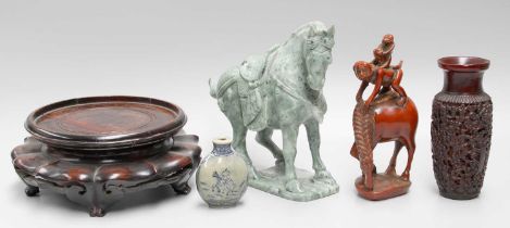 A Chinese Carved Green Hardstone Tang Style Horse, together with a resin model group and vase, a