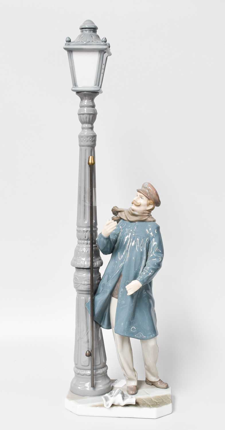 A Large Lladro Figure "The Lamplighter", 48cm high