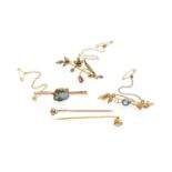 Three bar brooches, comprising a boulder opal example, stamped ‘9CT’; a 9 carat gold garnet and