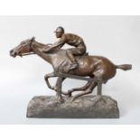 A Reproduction Spelter Model of a Horse and Jockey, "Vers La Victoire!", 32cm h