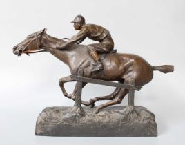 A Reproduction Spelter Model of a Horse and Jockey, "Vers La Victoire!", 32cm h