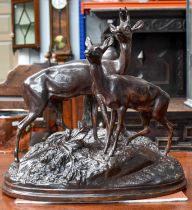 A 20th Century Russian Bronze of a Roebuck and Doe, on a naturalistic base, from the Kasli Iron