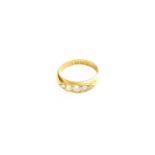 An 18 Carat Gold Diamond Five Stone Ring, the graduated old cut diamonds in yellow claw settings, to