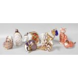Eight Royal Crown Derby Imari Paperweights Cat, Pheasant with no stoppers, elephant and penguin