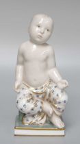 A Royal Copenhagen Figure of a Young Boy, painted and impressed marks, model number 2083, 17cm high