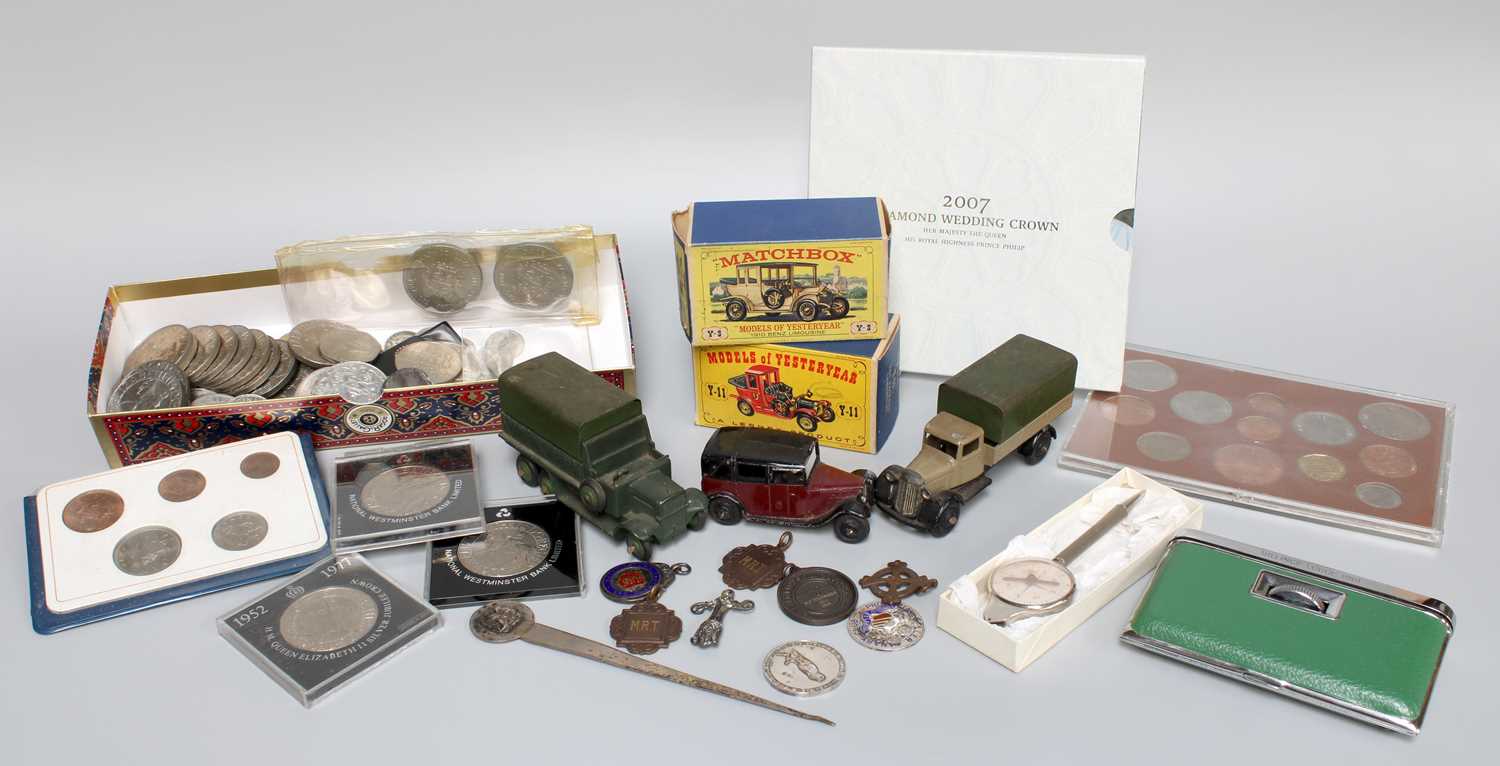 A Group of Coins including a Victorian Crown, Elizabeth II proof sets, Commemorative Jubilee Crowns,