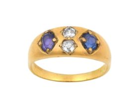 A Sapphire and Diamond Four Stone Ring, the oval cut sapphires spaced by two old cut diamonds, in