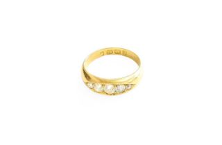 An 18 Carat Gold Diamond Five Stone Ring, the graduated old cut diamonds in yellow claw settings, to