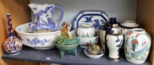 A Shelf of Decorative Ceramics, including a Mason's blue and white toilet jug and basin (af),