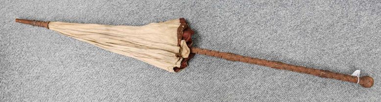 A French Parasol, with basket weave carved decoration to the haft