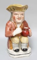 A Late 19th Century Toby Jug, painted in enamels, 25cm high