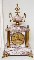 A Marble and Gilt Metal Mounted Striking Mantel Clock, retailed by Philippe & Roissiere a Rouen,