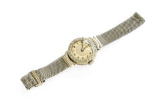 A Lady's 18 Carat White Gold Diamond Wristwatch, with attached 9 carat white gold bracelet, clasp