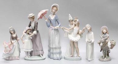 Six Lladro figures, comprising lady with parasol, girl with parasol, girl with chamberstick, Pierrot