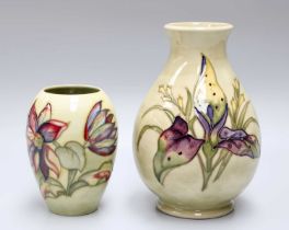 A Walter Moorcroft Wid Arum Pattern Vase and a Walter Moorcroft Clematis vase, tallest 20cm (2)