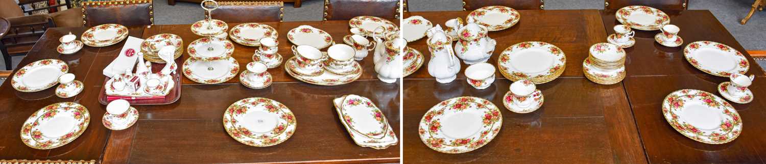 Royal Albert Old Country Roses Dinner and Teawares, including: 14 dinner plates, a cake stand,