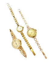 A Lady's 15 Carat Gold Wristwatch, and two lady's 9 carat gold wristwatches Two watches with gold