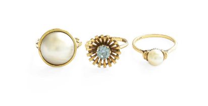 A 9 Carat Gold Cultured Pearl Ring, finger size O1/2; A 9 Carat Gold Blue Zircon Ring, finger size