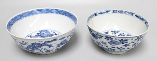 A Chinese Porcelain Bowl, Kangxi, painted in underglaze blue with foliage, 15cm diameter; together