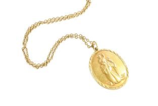A 9 Carat Gold St Christopher Pendant on Chain, the oval pendant on a trace link chain, pendant