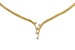 A 9 Carat Gold Diamond Necklace, the yellow articulated links terminating centrally to a v-motif,