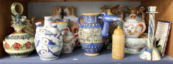 A Shelf of Decorative Ceramics, including Isnic style vases and vessels, a pair of twisted
