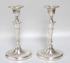 A Pair of George V Silver Candlesticks, by Walker and Hall, Sheffield, 1926, each in the George