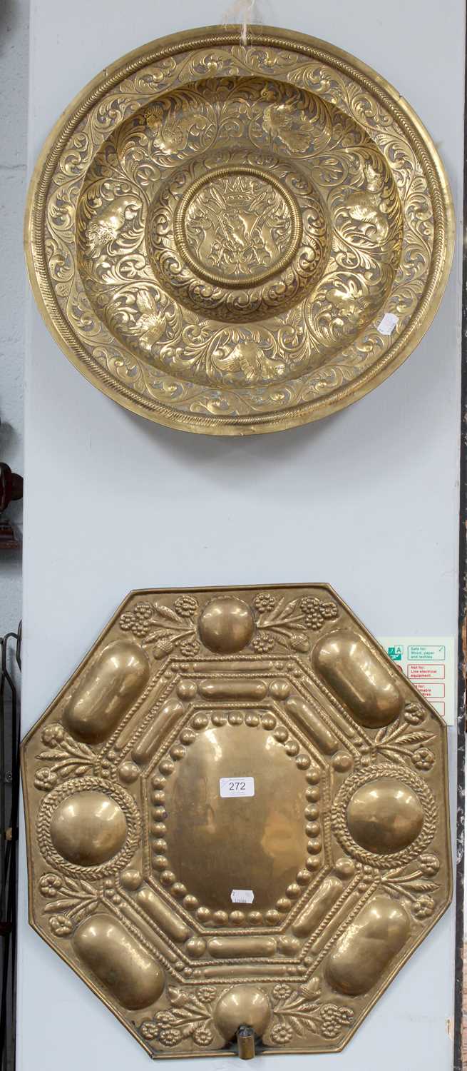 A Nuremberg Style Brass Alms Dish, central boss with repousee crest within foliate scroll border - Image 2 of 3