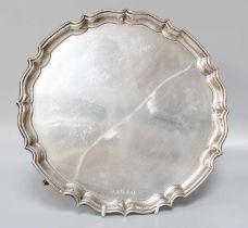 A George V Silver Salver, by Padgett and Braham Ltd., Birmingham, 1935, in the George II style,