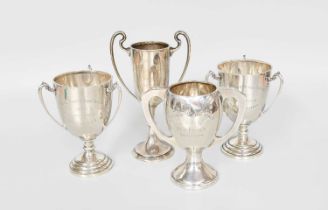 Four Various Silver Trophy-Cups, including a pair with three handles, each engraved for the Rydal