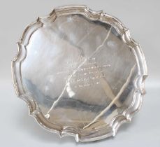 A George VI Silver Salver, by James Dixon and Sons, Sheffield, 1943, shaped circular and on four