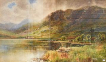 Arthur Wilkinson (c.1860-1930) Cattle watering in a mountainous landscape Signed, watercolour, 70.