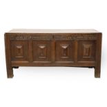 A Late 17th Century Joined Oak Chest, initialled AP and dated 1689, the boarded hinged lid above a