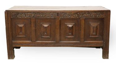 A Late 17th Century Joined Oak Chest, initialled AP and dated 1689, the boarded hinged lid above a
